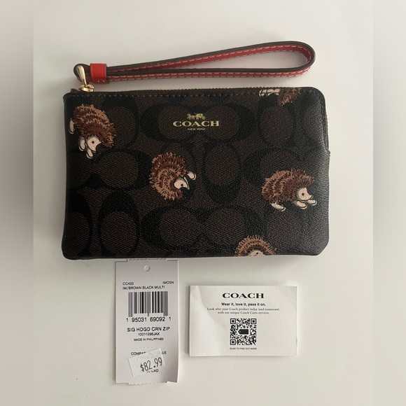 Coach Bags Coach Corner Zip Wristlet In Signature Canvas Hedgehog